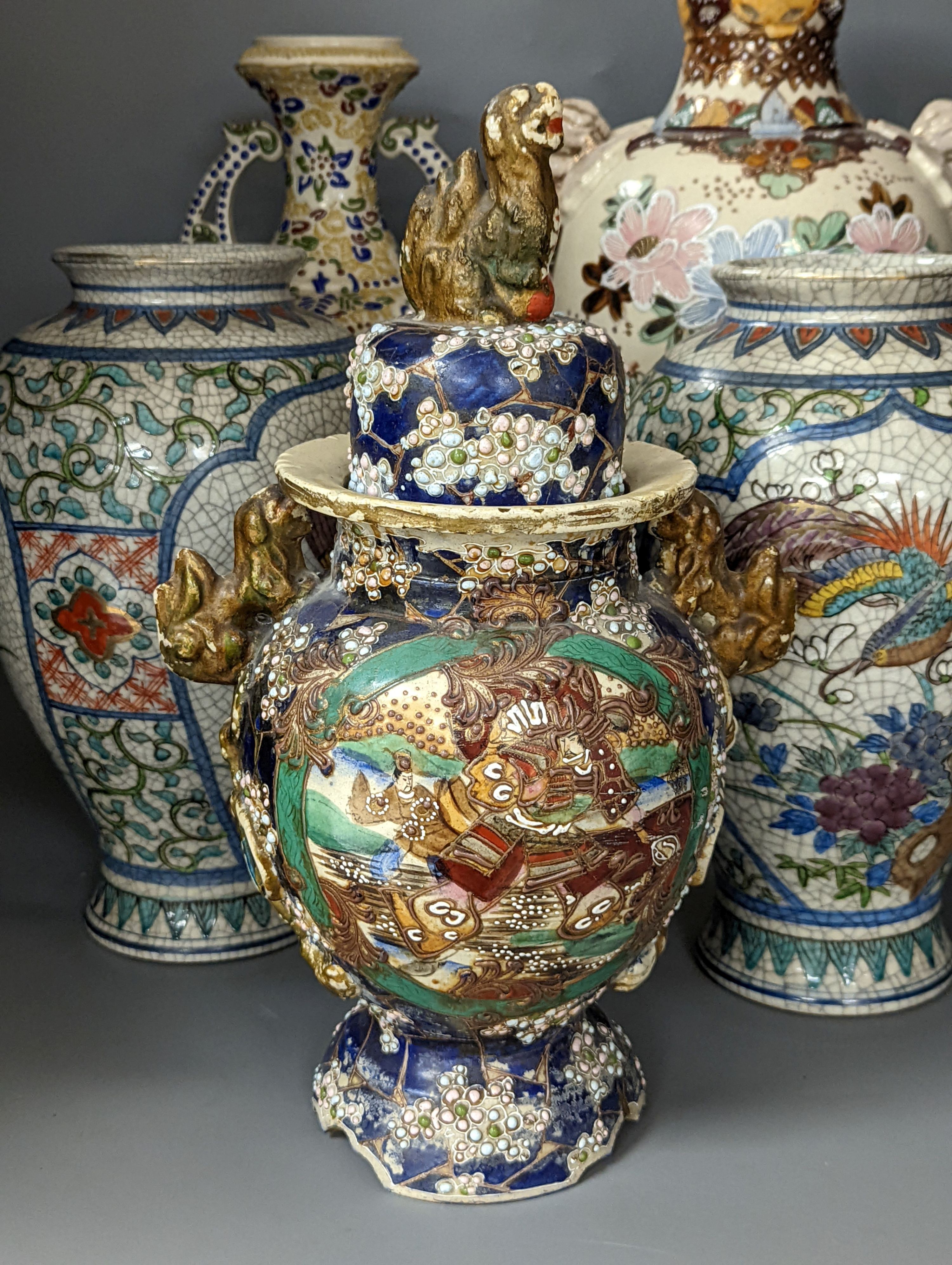 A pair of Japanese crackle ware vases, a lidded vase and 2 others, tallest 60 cms high.